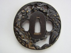 the mei on your tsuba reads CHIKAMOTO and kao, and is by an artist listed in Haynes’ Index as In ...