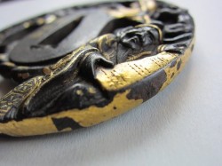 the mei on your tsuba reads CHIKAMOTO and kao, and is by an artist listed in Haynes’ Index as In ...