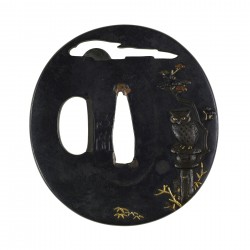 Tsuba with an Owl on a Stone Lantern
Description	
English: Across the top of this tsuba, an open ...