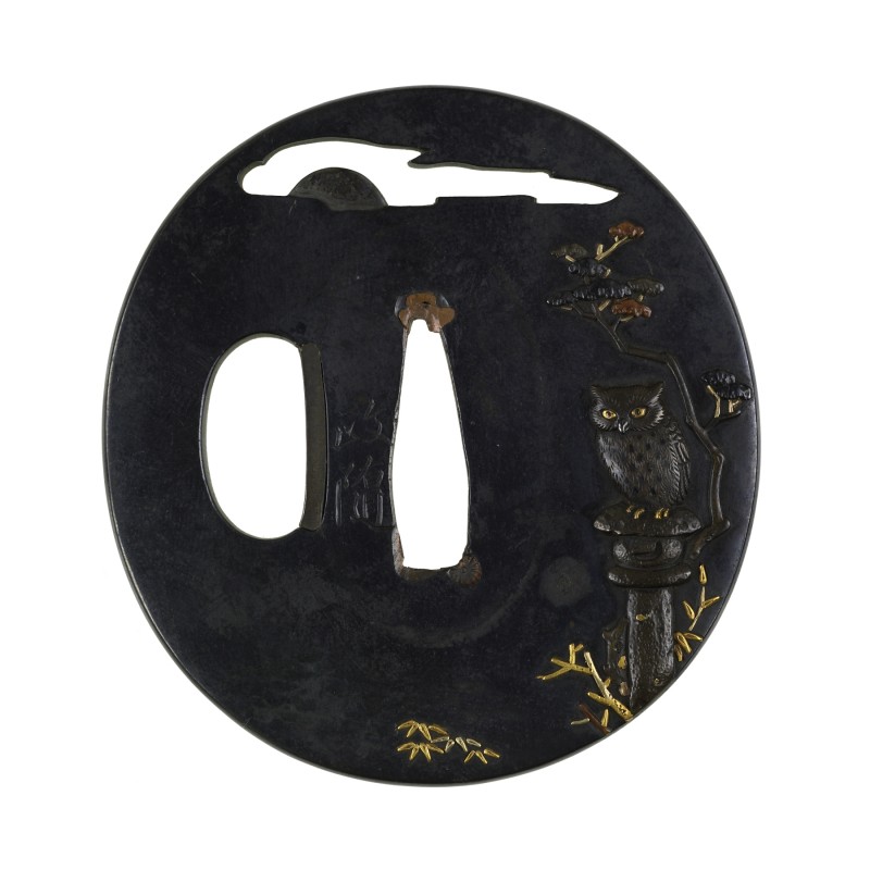 Tsuba with an Owl on a Stone Lantern
Description	
English: Across the top of this tsuba, an open ...