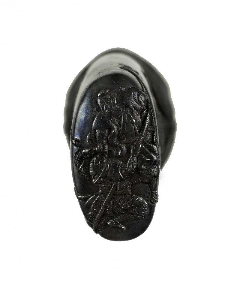 Tsuka with Yamabushi and Warrior
Description	
English: The tsuka is covered in ray skin (“ ...