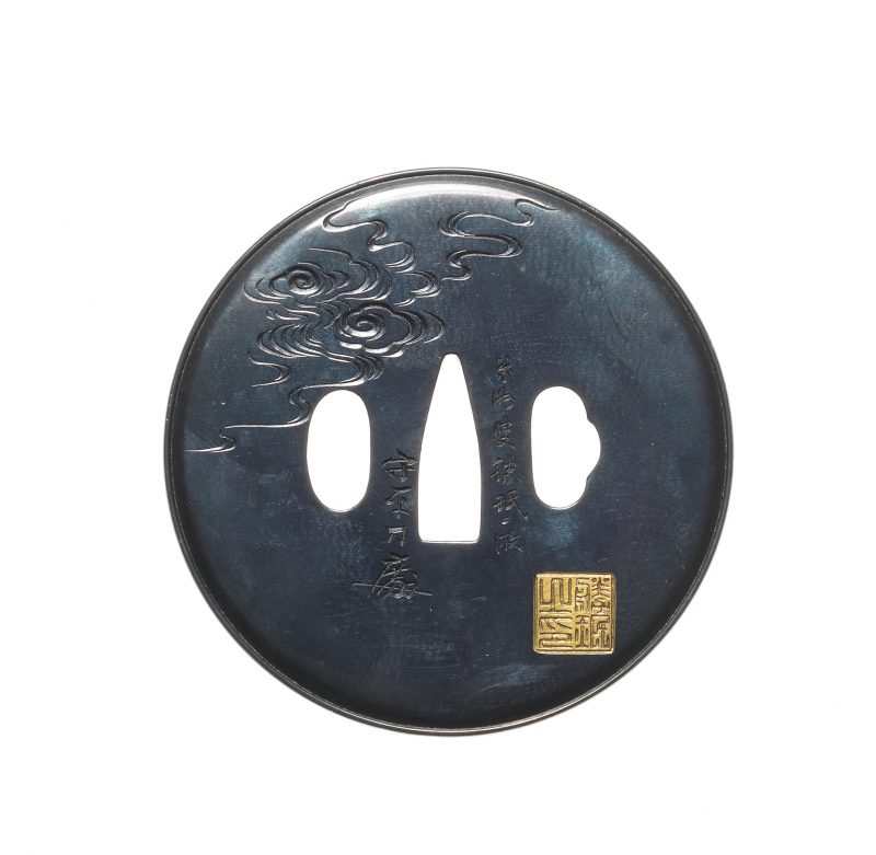 A shakudo tsuba
By Yanagawa Morihira (1899-1971), after Unno Shomin, 20th century
Of circular fo ...