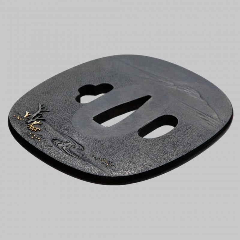 A beautiful shakudo Tsuba by Uchikoshi Hiromitsu. The scenery is beautifully worked in shakudo,  ...