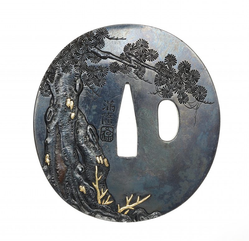 A shakudô tsuba. Edo period, third quarter 18th century

Of oval shape, carved with Kanzan and J ...