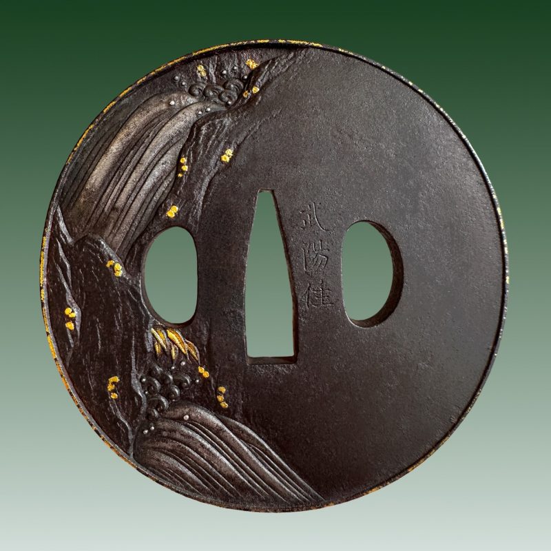 mid Edo – Edo – Murakami school

This is an iron tsuba with gold and silver inlays and incredibl ...