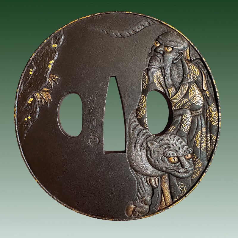 mid Edo – Edo – Murakami school

This is an iron tsuba with gold and silver inlays and incredibl ...