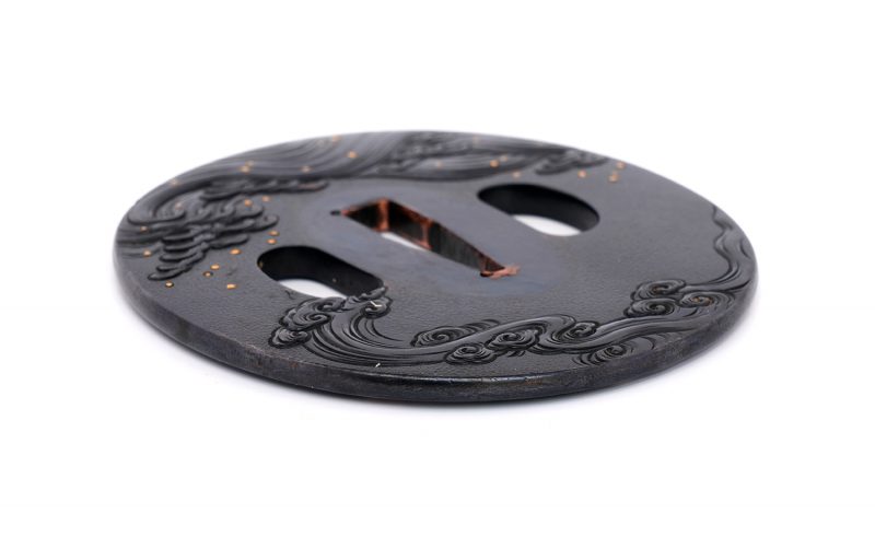 Tsuba with Wave Design
Unsigned (Mumei)
Height: 79.8 mm / Width: 73.1 mm / Seppa-dai thickness:  ...