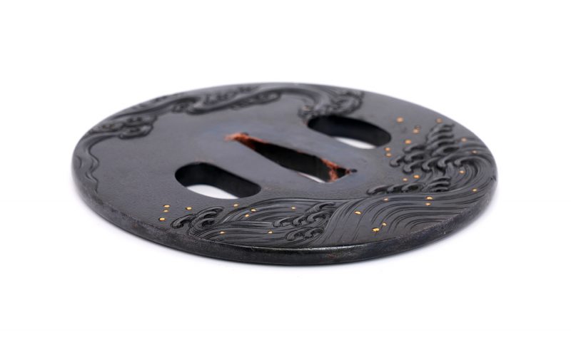 Tsuba with Wave Design
Unsigned (Mumei)
Height: 79.8 mm / Width: 73.1 mm / Seppa-dai thickness:  ...