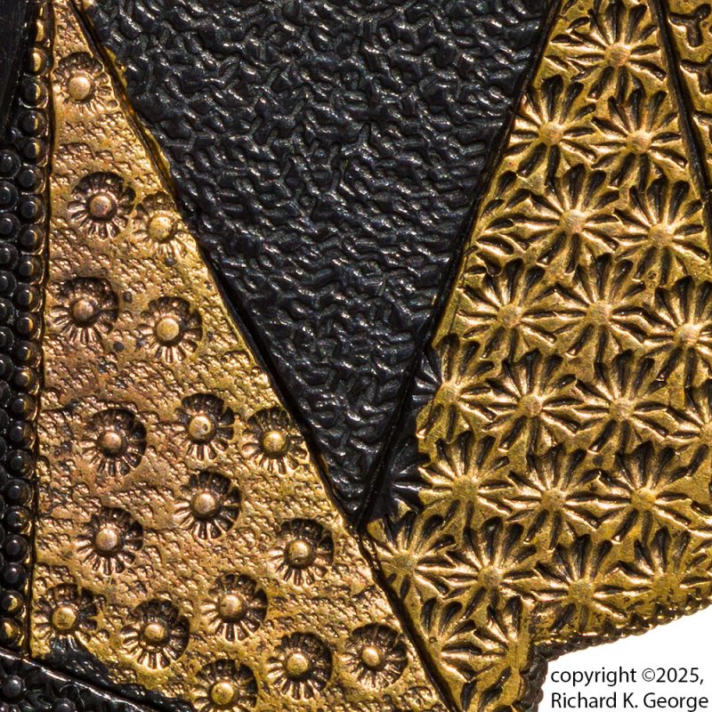 This one is still a bit of a head scratcher.  This mokko shaped tsuba measures 82.8mm(H) X 78.5m ...