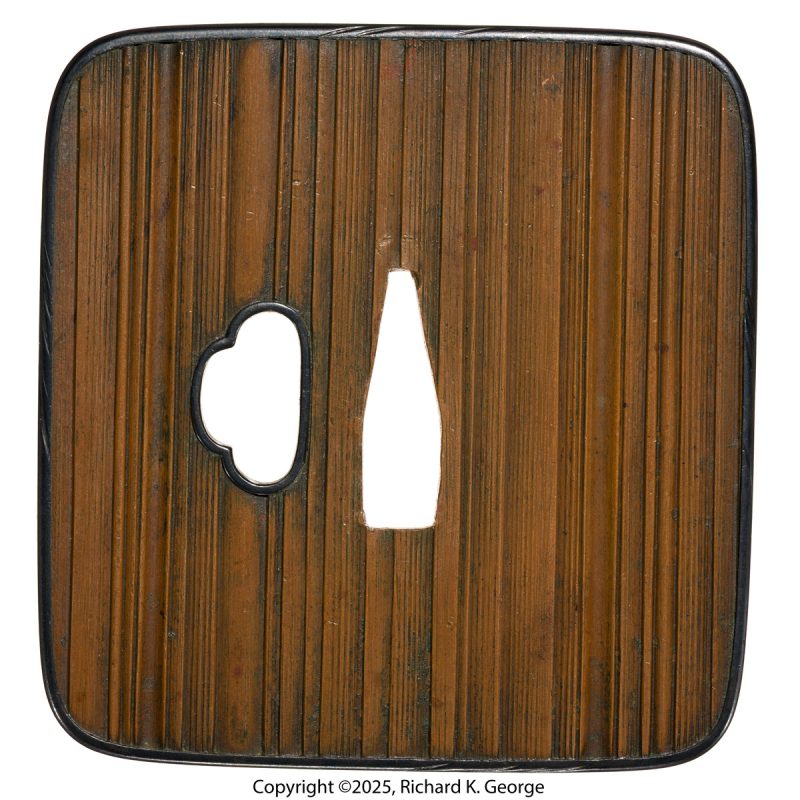 This tsuba is another “burly” piece.  It is made of suaka (red copper) with a shakud ...