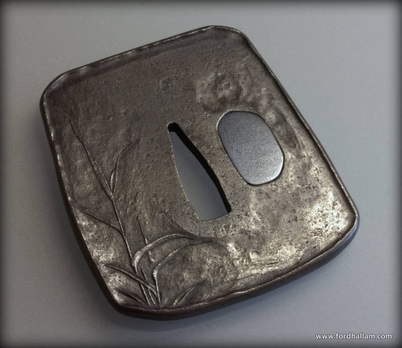 A study in textural and compositional contrasts.
A tsuba called ‘Shinsei’  新生 
This tsuba is m ...