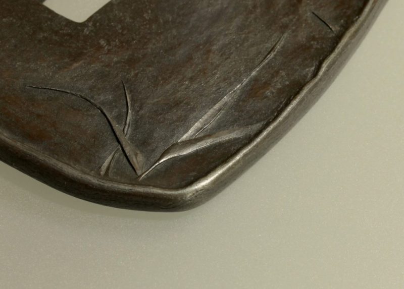 A study in textural and compositional contrasts.
A tsuba called ‘Shinsei’  新生 
This tsuba is m ...