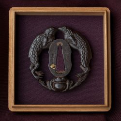 Ichinomiya Sadanaka Tsuba
Ichinomiya Tsunenao Frog Tsuba

This Tsuba is a very interesting Machi ...