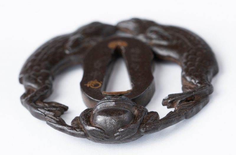 Ichinomiya Sadanaka Tsuba
Ichinomiya Tsunenao Frog Tsuba

This Tsuba is a very interesting Machi ...