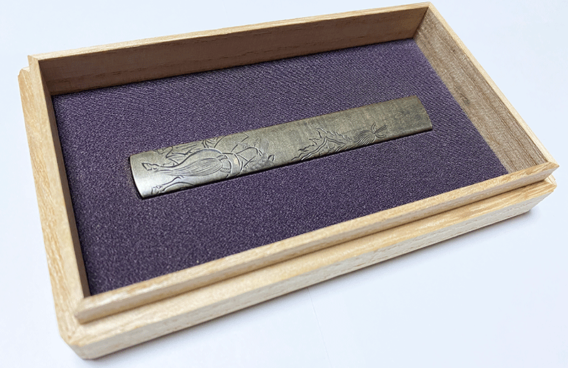 Made by Yokoya Sōmin (横谷宗珉作, よこや そうみん) — Tokubetsu Hozon Koshirae Fitting (Kozuka)

 ...