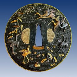 Tsuba with design of dancing cranes and plovers and waves.

With inscription “Soheishi, Mu ...