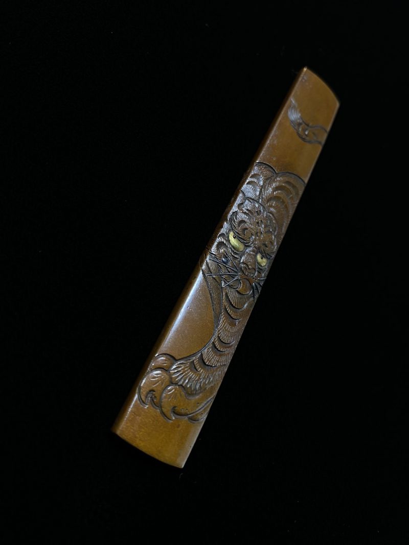 Before heading to work, I’m looking at the small koshirae with the fierce tiger painting b ...