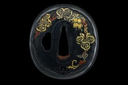Tsuba: Umetada “Budō-mon no tsuba”

Signature/mei: Umetada

Material: shakudō ground, various so ...