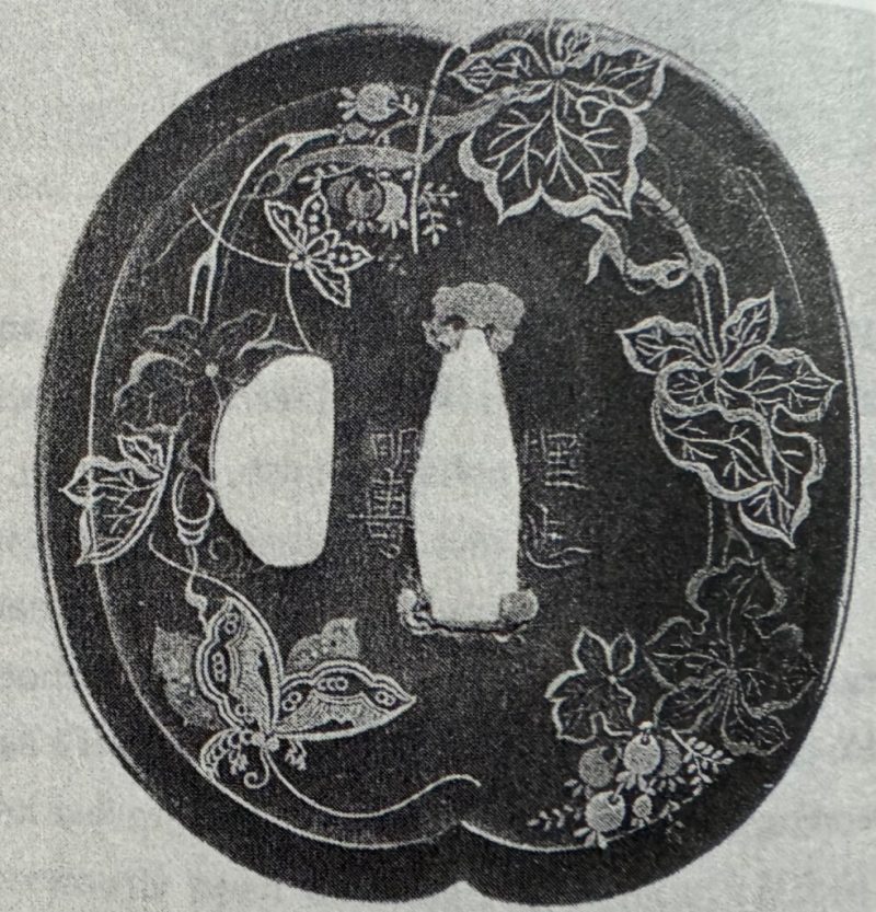 “Budō ni kochō-mon no zu tsuba”

Designated as jūyō-bunkazai and signed “Umeta Myōju”

futatsū-m ...