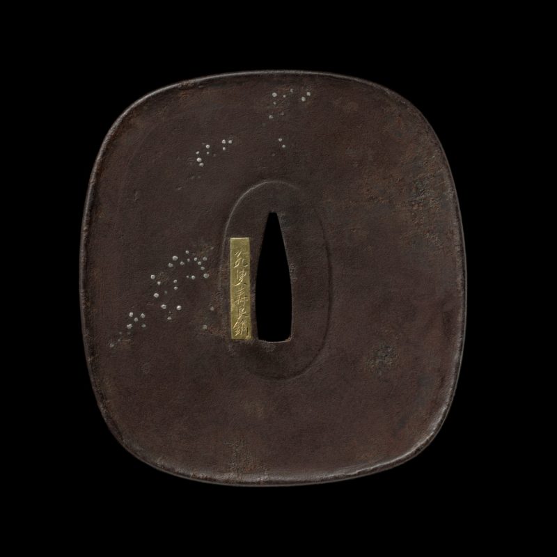 Tsuba with monk in the snow
This sword guard depicts a young monk who is caught in a snowstorm w ...