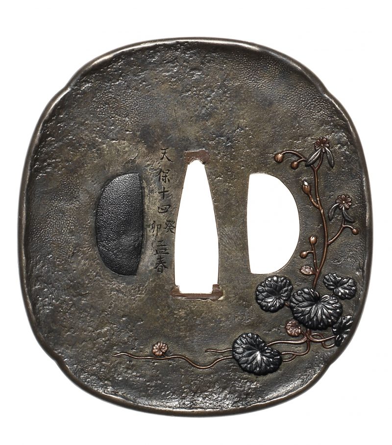 A shibuichi tsuba
Attributed to Funada Ikkin (1812-1863), dated 1843
Of rounded rectangular form ...